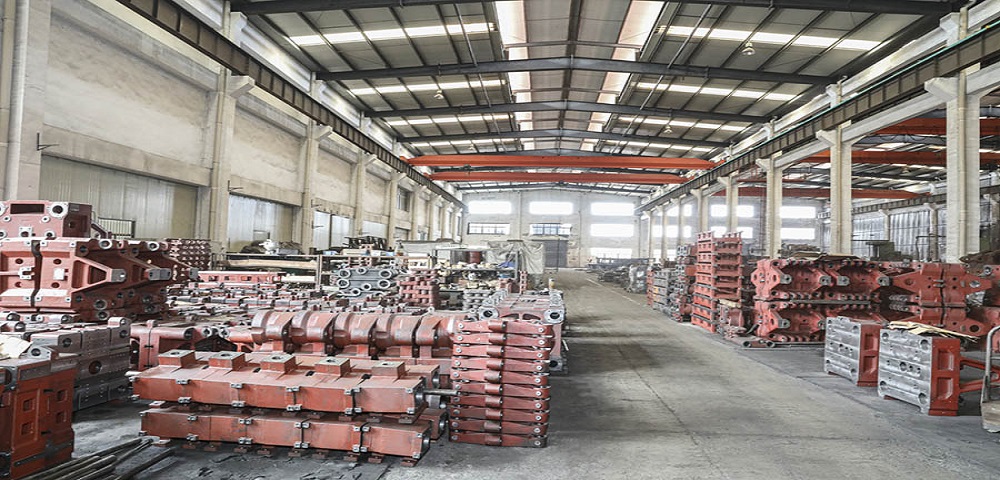 Se ci sono alcune particelle metalliche nel materiale, danneggerà le parti della macchina per iniezione?